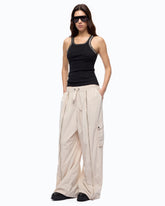 Top a costine con ricami gioiello - | Pinko