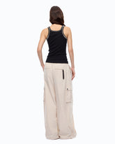 Top a costine con ricami gioiello - | Pinko