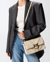 Medium Love Bag pebbled leather crossbody bag with V-shaped pattern and logo - | Pinko
