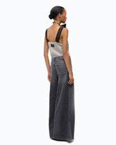 Flared jeans with super wide leg in black denim - | Pinko