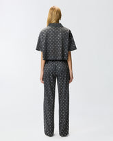 Polo corto de malla con detalles espejados - | Pinko