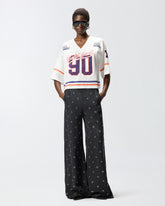 T-shirt cropped con scollo a V e patch logate - | Pinko