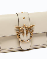 Mała torebka na ramię Love Bag Pocket ze skóry z biżuteryjną klamrą - | Pinko