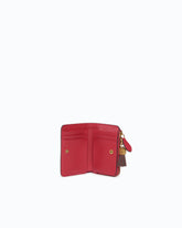 Mini-Geldbörse aus Leder mit Quasten - | Pinko