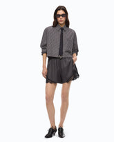 Shorts fluidi con inserto in pizzo - | Pinko