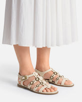 Flat sandals with straps and studs - | Pinko