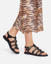 Flat sandals with straps and studs - | Pinko