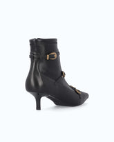 Boots with straps and jewel studs - | Pinko