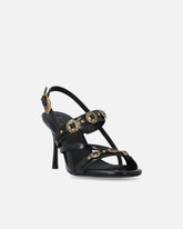 Sandalias destalonadas altas con correas y tachuelas - | Pinko