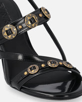 Sandalias destalonadas altas con correas y tachuelas - | Pinko