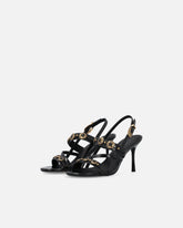 Sandalias destalonadas altas con correas y tachuelas - | Pinko