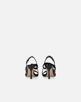 Sandalias destalonadas altas con correas y tachuelas - | Pinko
