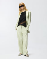 Top smanicato con dettagli in pizzo -  | Pinko