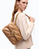 Sac à bandoulière Love Bag Puff moyen en cuir nappa matelassé avec boucle bijou -  | Pinko