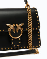 Mini Love Bag One Top Handle Light handbag in leather with mini studs -  | Pinko