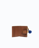 Portefeuille multifonction en cuir avec pompon -  | Pinko