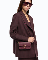 Baby Love Bag One Slouchy crossbody bag in new biker leather -  | Pinko