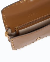 Baby Love Bag One Slouchy crossbody bag in leather with studs -  | Pinko