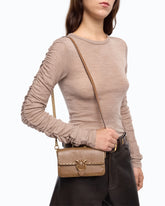 Borsa a tracolla Baby Love Bag One Slouchy in pelle con borchie -  | Pinko